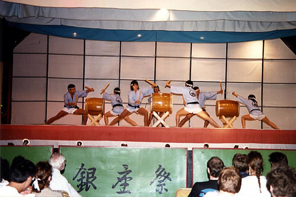 Midwest Buddhist Temple Taiko Group, Ginza Holiday Festival, Chicago, 1987. The Midwest Buddhist Temple Taiko group, the first to be formed in the region, was founded in 1977 at the Midwest Buddhist Temple in Chicago, Illinois.